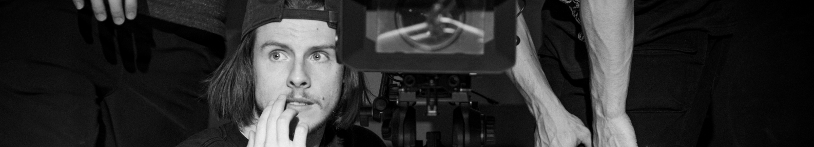 Parker sits on a dolly on set. Photo credit Jordan Skutar.
